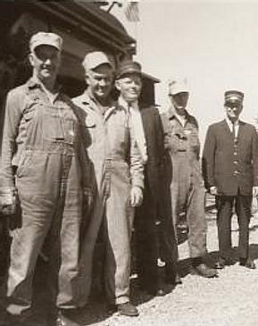 a group of people posing for a photo